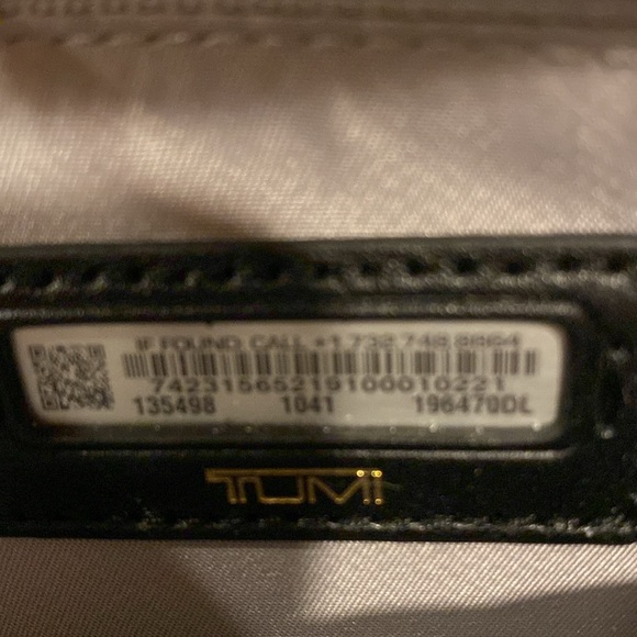 Tumi crossbody bag.
Length is 8.5 inches 
Height is 5.5 inches - Picture 10 of 15
